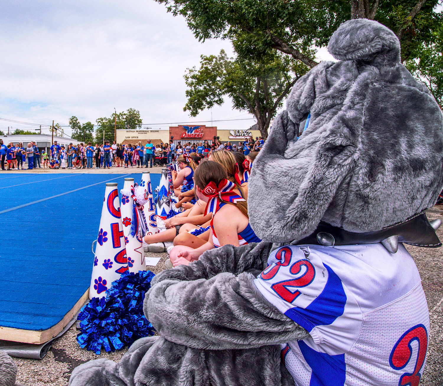 The Quitman Bulldogs cheerleaders and mascots wait patiently for their turn to rile up the crown on the courthouse lawn. [see more sights & buy Bulldogs prints]